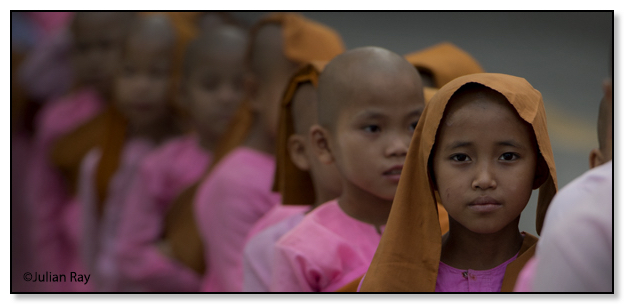 Young novice nuns in a row